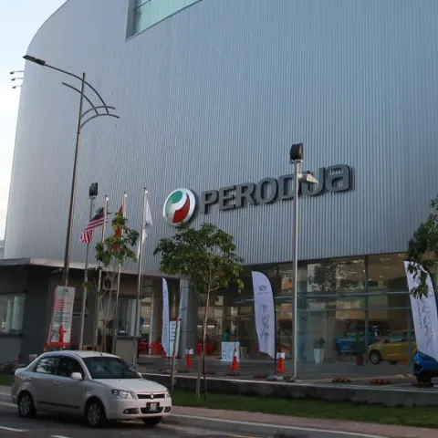 Perodua front seats with supportive bolstering shown clearly.