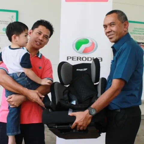 Perodua front seats with supportive bolstering shown clearly.