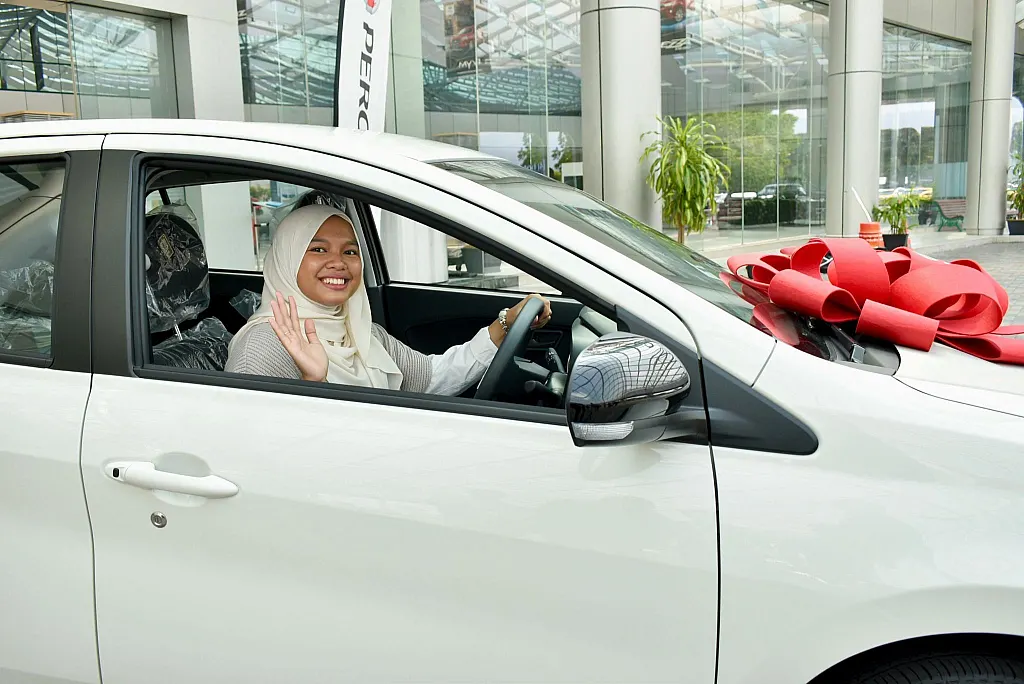 UiTM student wins P-Circle Lucky Draw Grand Prize, drives home a Perodua Myvi