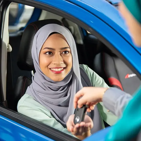 Perodua front seats with supportive bolstering shown clearly.