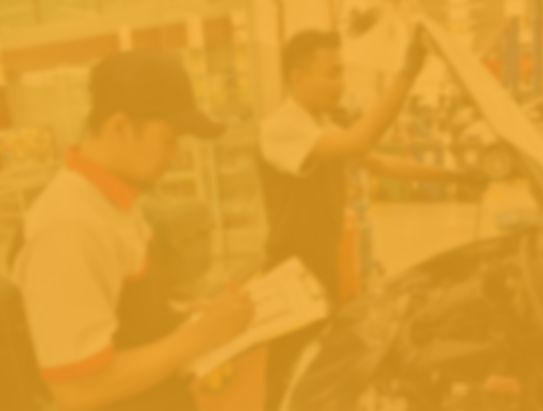 Perodua PRESERV service bay with technician at work